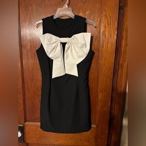 Elegant Black Mini Dress with Cream Bow